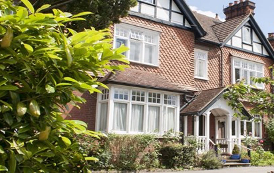 Sunny exterior of the entrance of Abbeyfield House, Reigate RH2 9DZ
