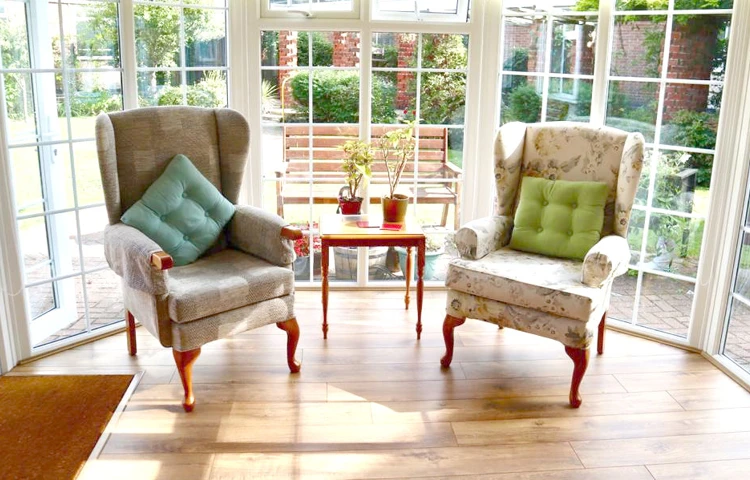 Bright and sunny communal lounge where residents can relax and catch up with friends and family