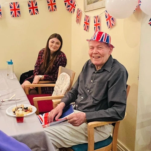 Two people celebrating the queens jubilee