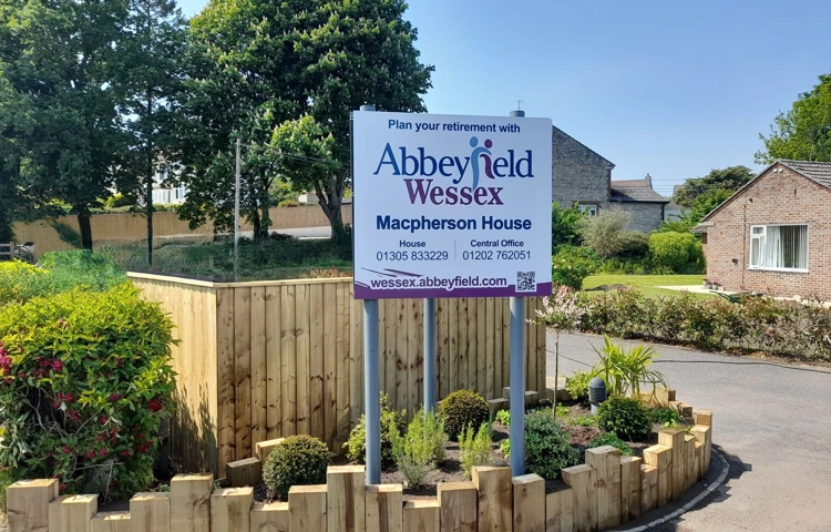 Macpherson House Sign