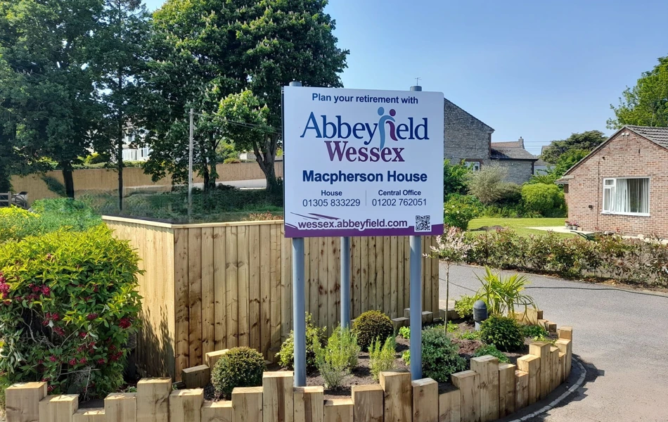 Macpherson House Sign