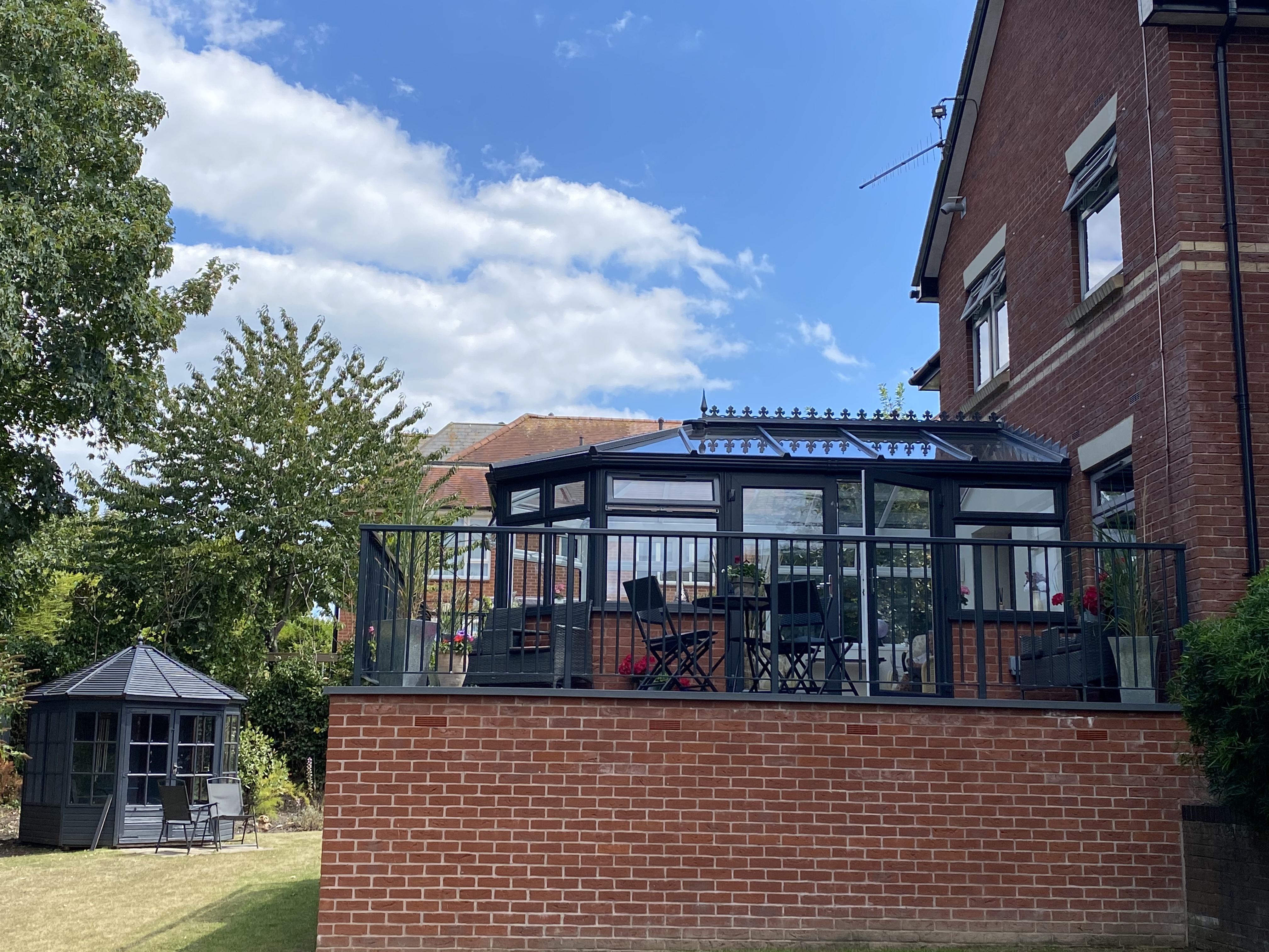 Outside view of conservatory with chairs outside at Westbourne House