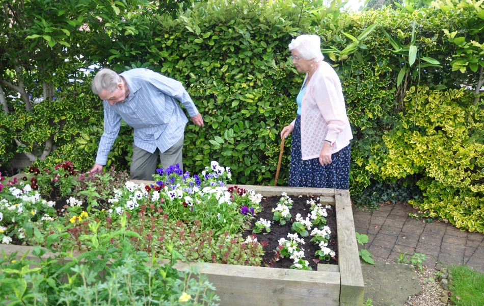 Residents gardening at Abbeyfield House, Chipping Sodbury BS37 6LB