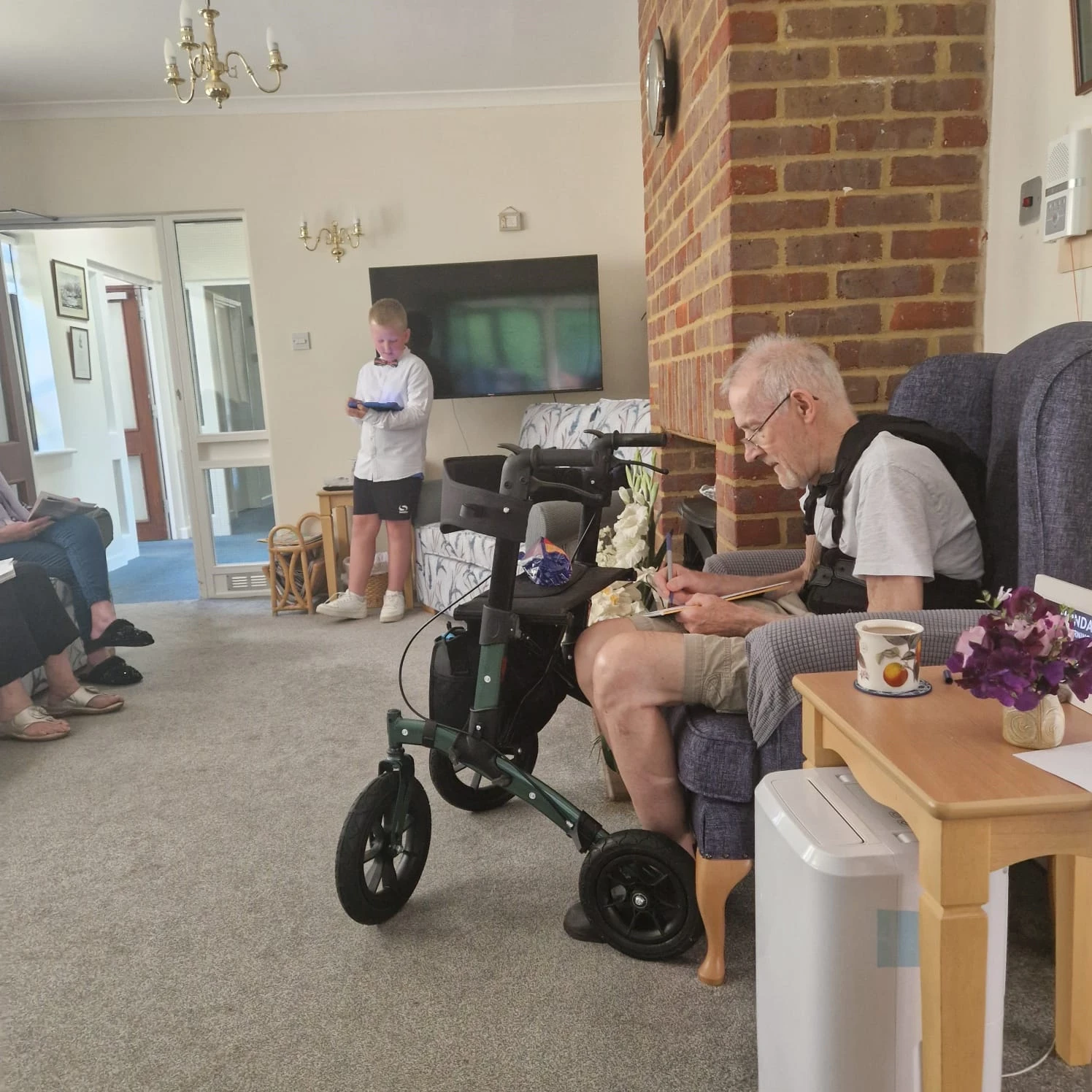 A child running a quiz for residents