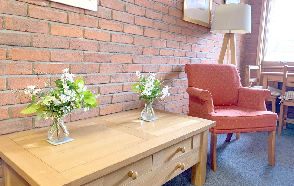 Seating area by the window at Garrad House