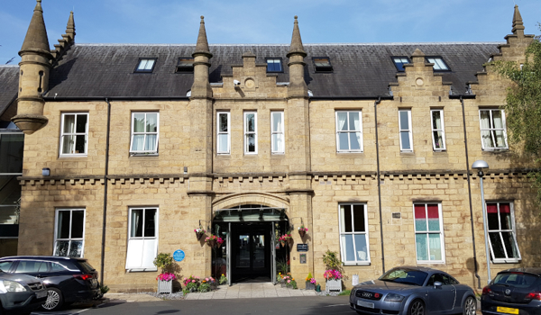 Outside entrance way to Grove House with its grand turrets