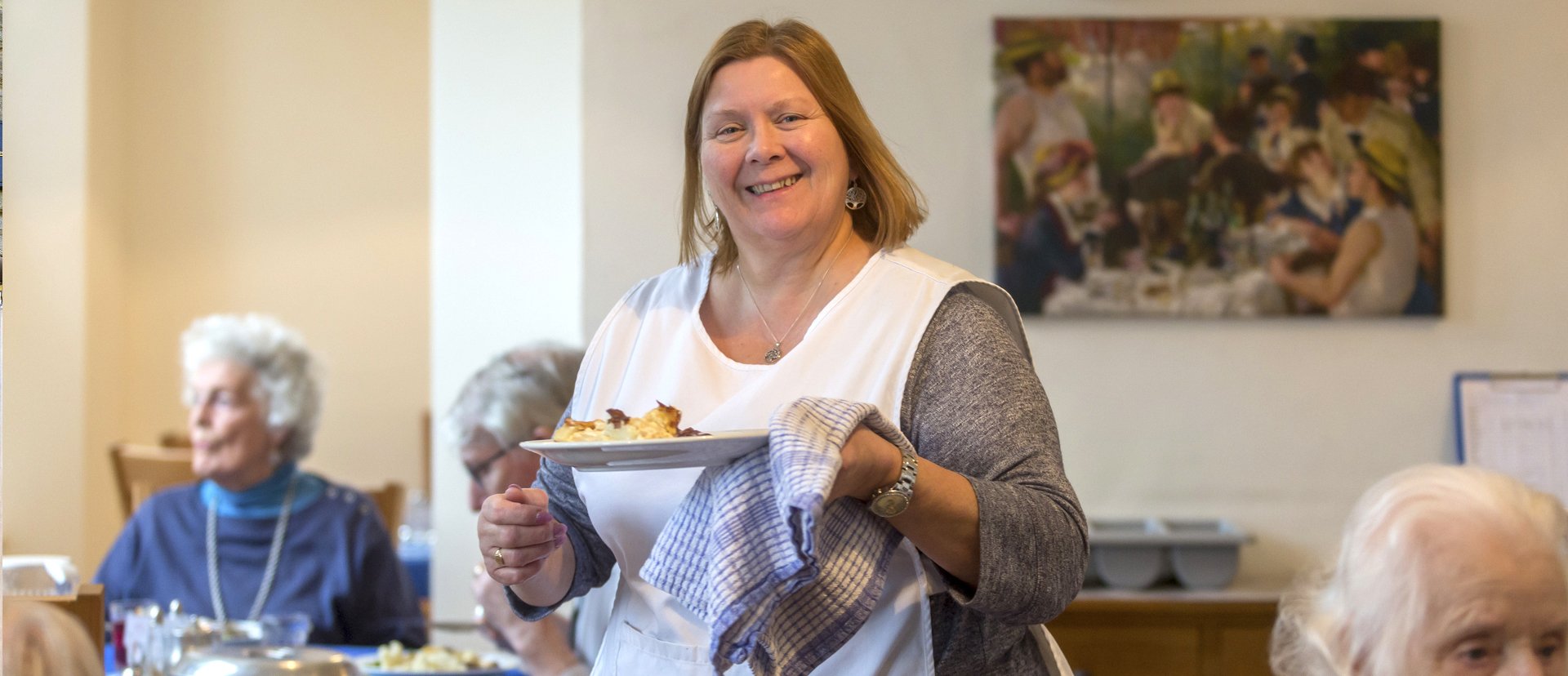 Serving hot food at Abbeyfield House, Bristol BS9 3AU