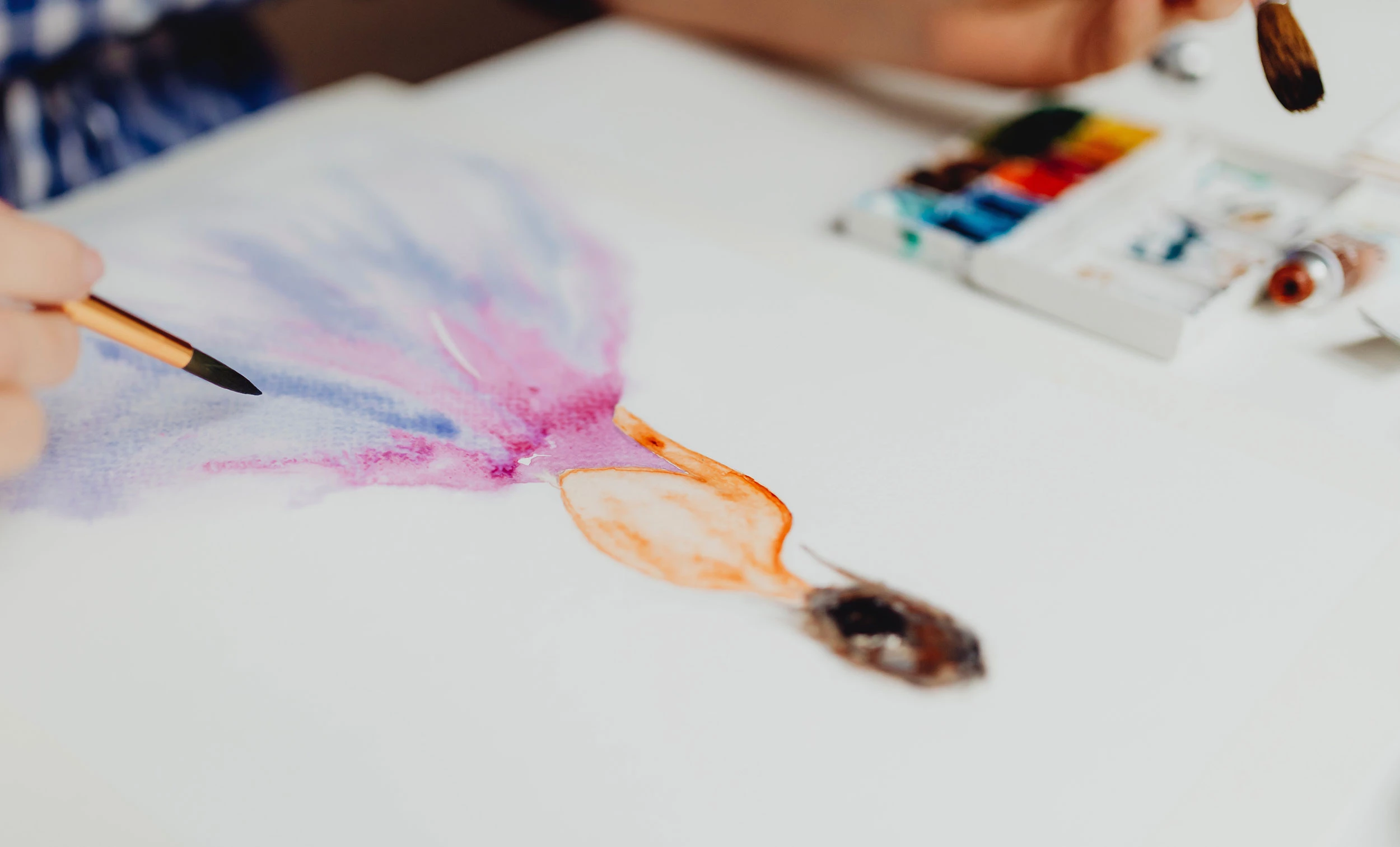 Person Painting A Picture Of Ballerina In Watercolours