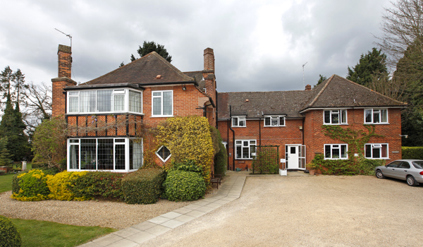 Front exterior of Austenmead with car park at the front of the house with rooms available to rent in Chalfont St Peter