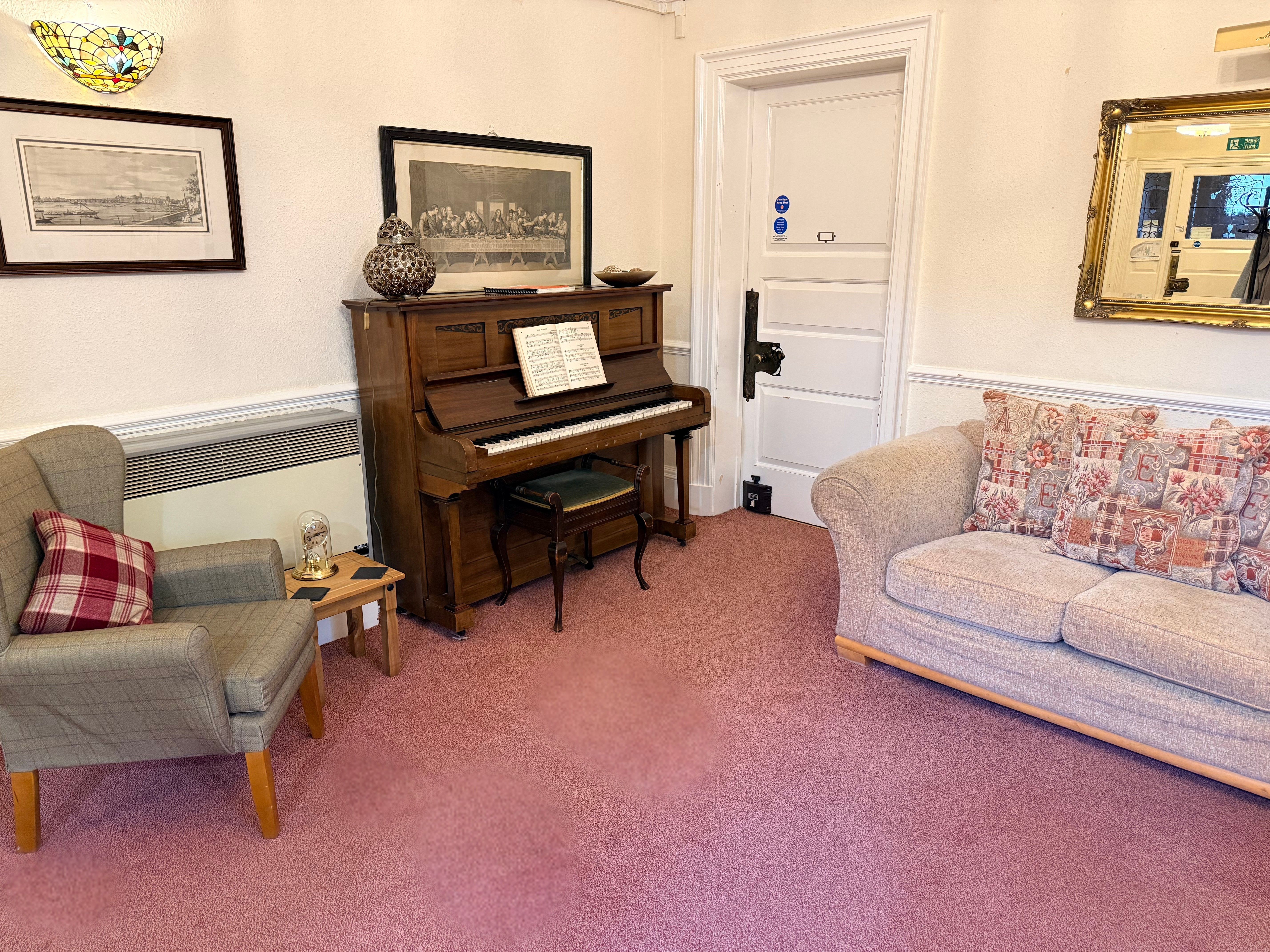 Sir Charles Starmer House Entrance Hall Sitting Area with Piano