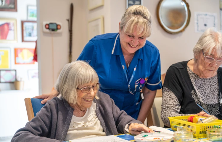 Residents And Staff Enjoy An Arts And Crafts Session At Winton House