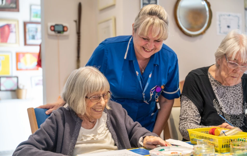Residents And Staff Enjoy An Arts And Crafts Session At Winton House
