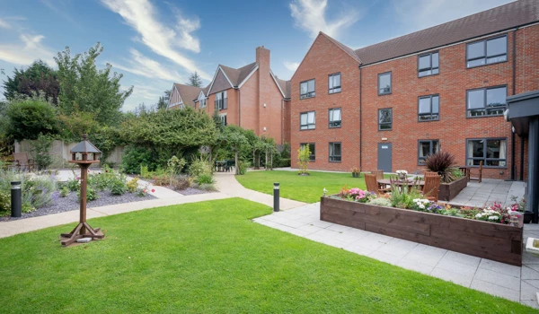 External shot of spacious garden with planter at Hampton House Solihull