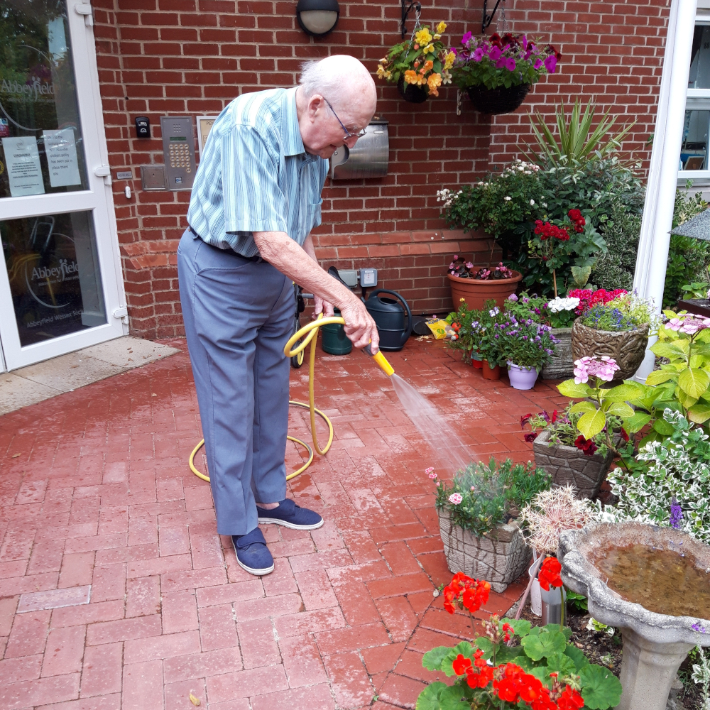 Pennant Watering Flowers