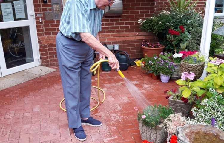 Pennant Watering Flowers