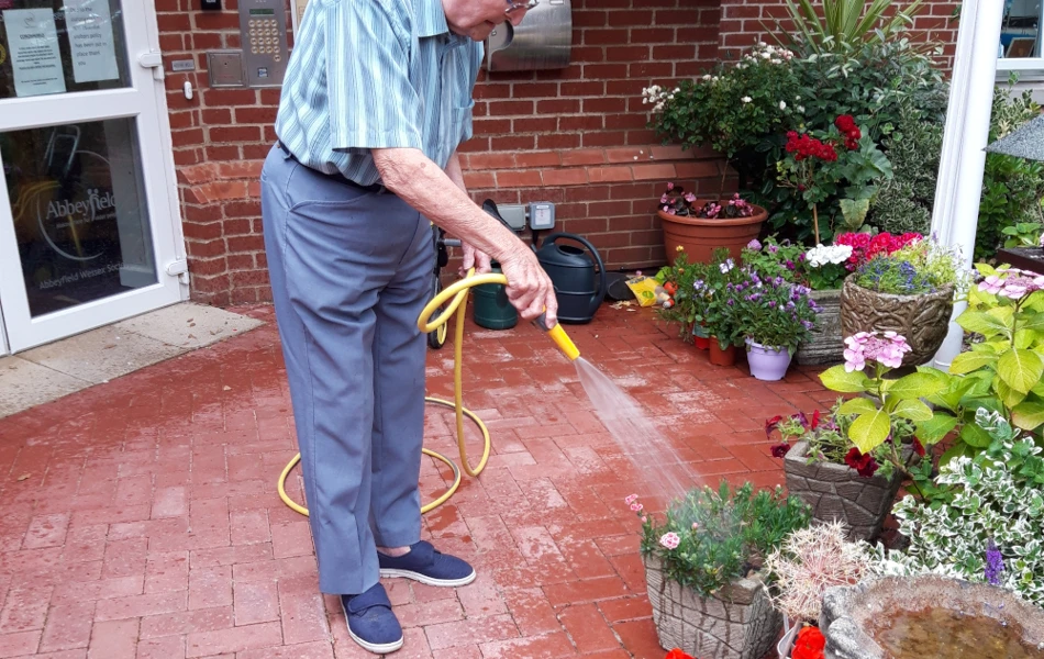 Pennant Watering Flowers