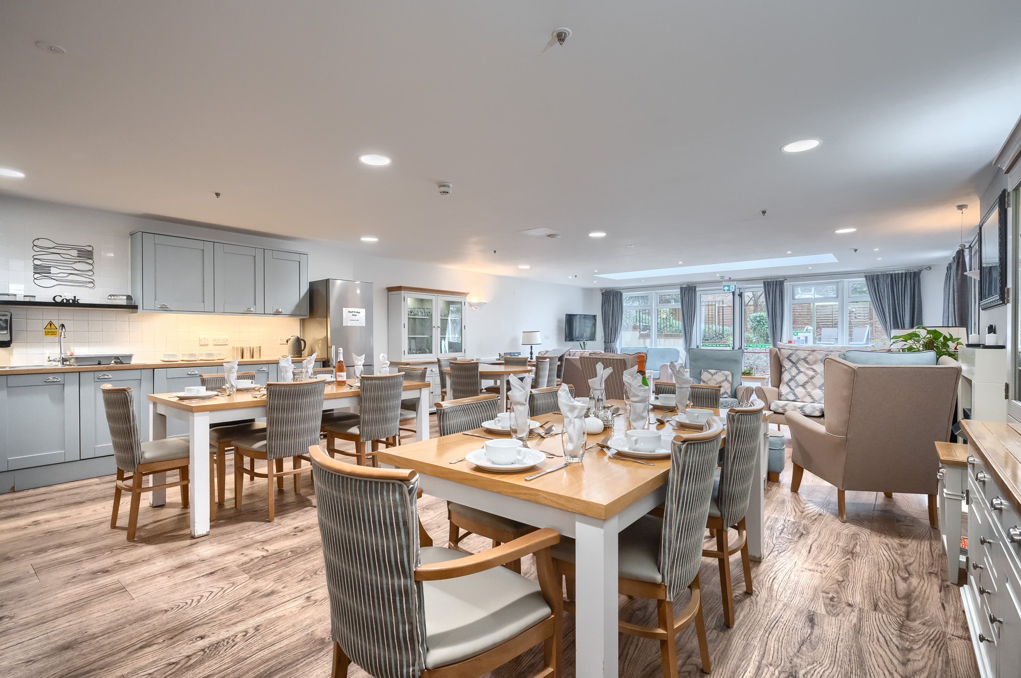 Our very spacious dining room with seating areas for residents