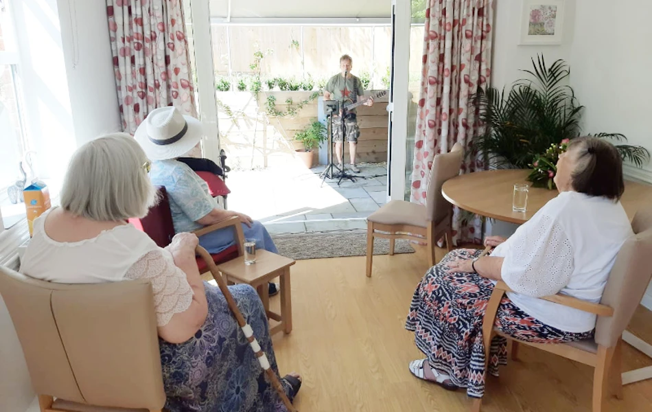 Residents Enjoying A Musical Performance