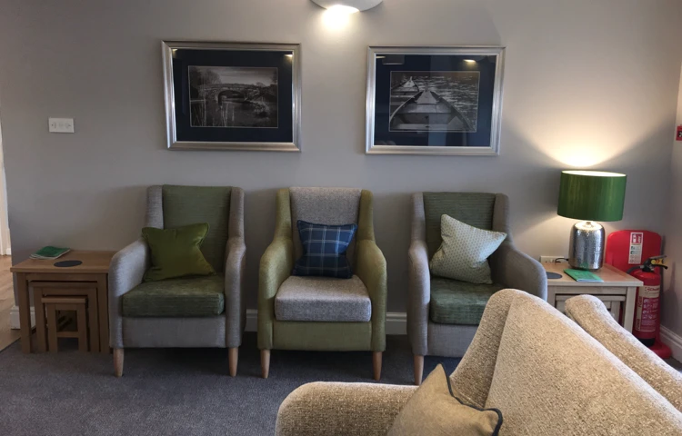 Three chairs in the lounge of Abbeyfield House, Garstang PR3 1PA