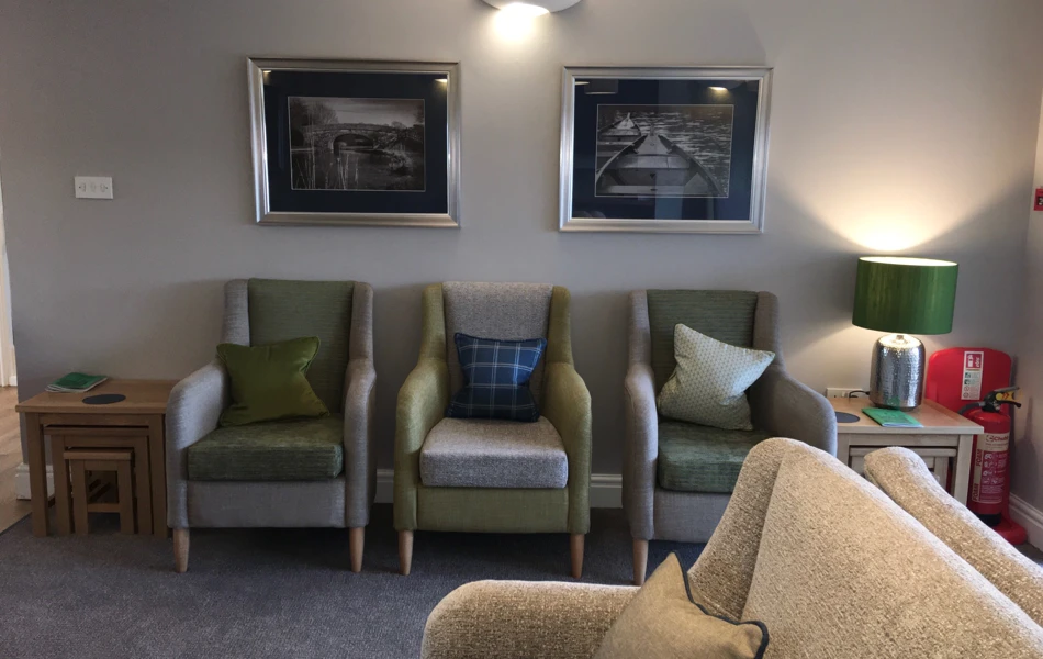 Three chairs in the lounge of Abbeyfield House, Garstang PR3 1PA