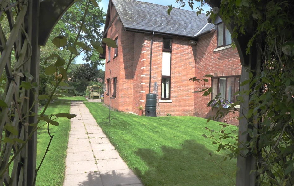 Lawns at the side of Abbeyfield House, Bishops Castle SY9 5PA