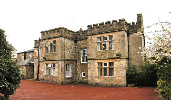 A photo of the castle-like house