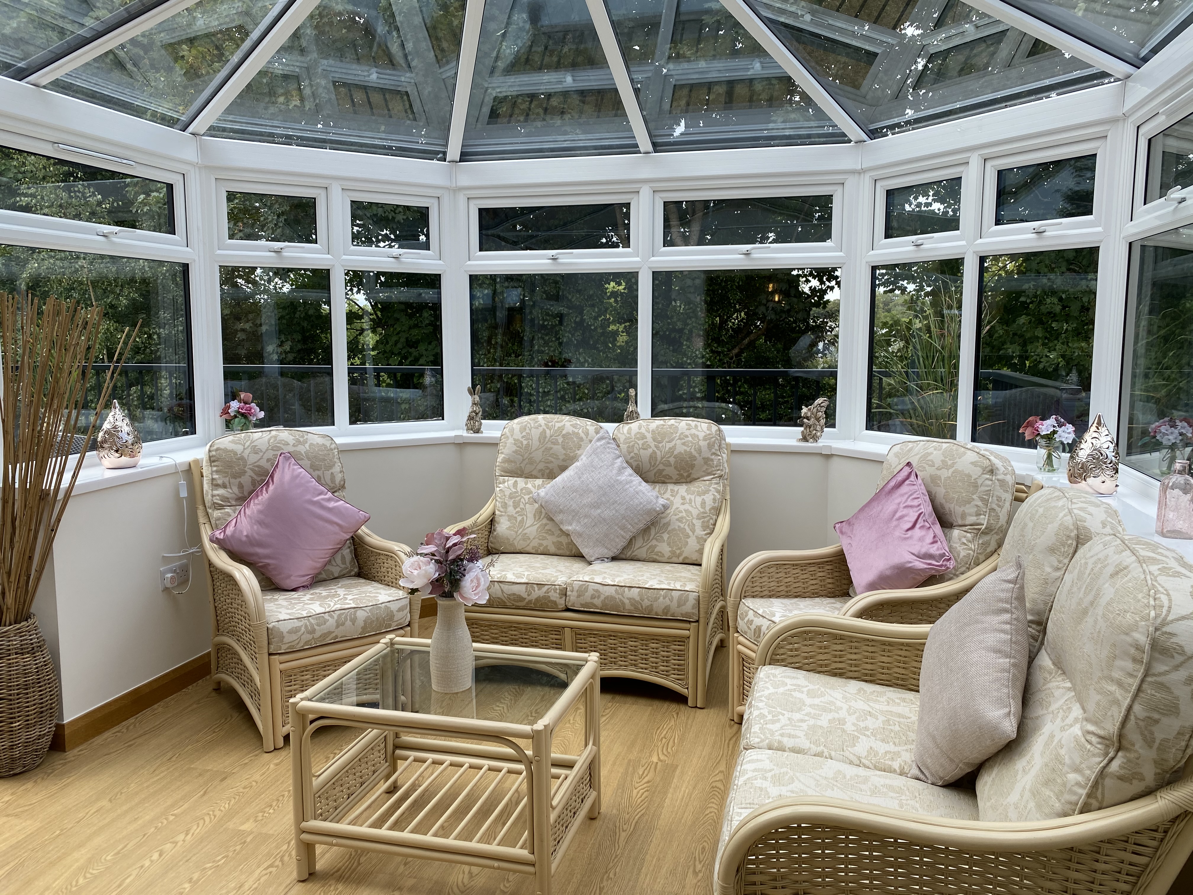 Westbourne House with conservatory furniture and view of the garden at Westbourne House