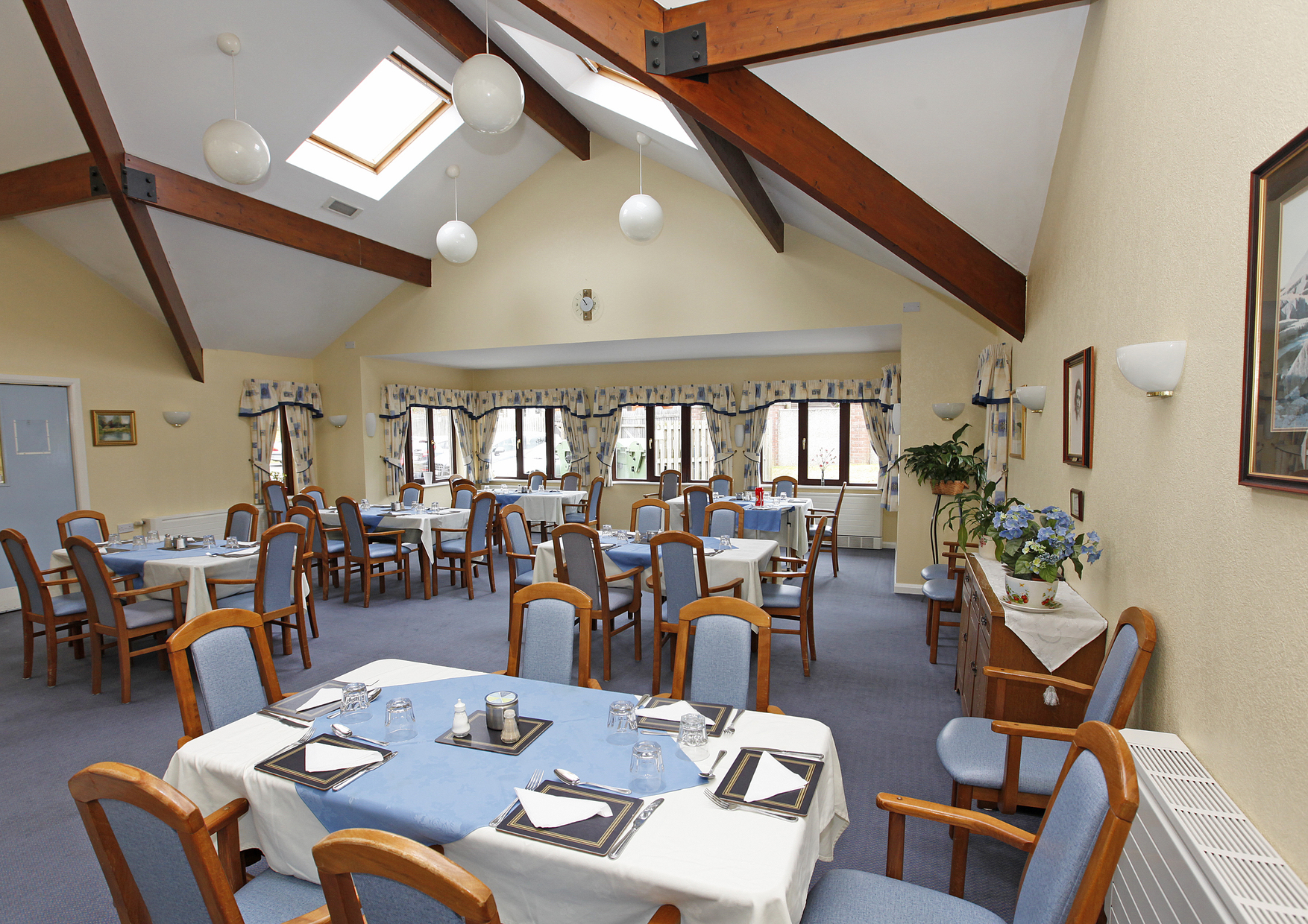 Dining room with blue tables and chairs