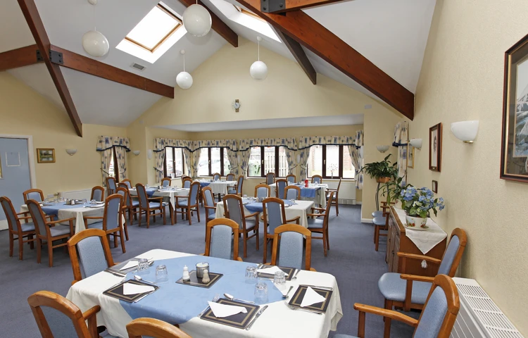 Dining room with blue tables and chairs