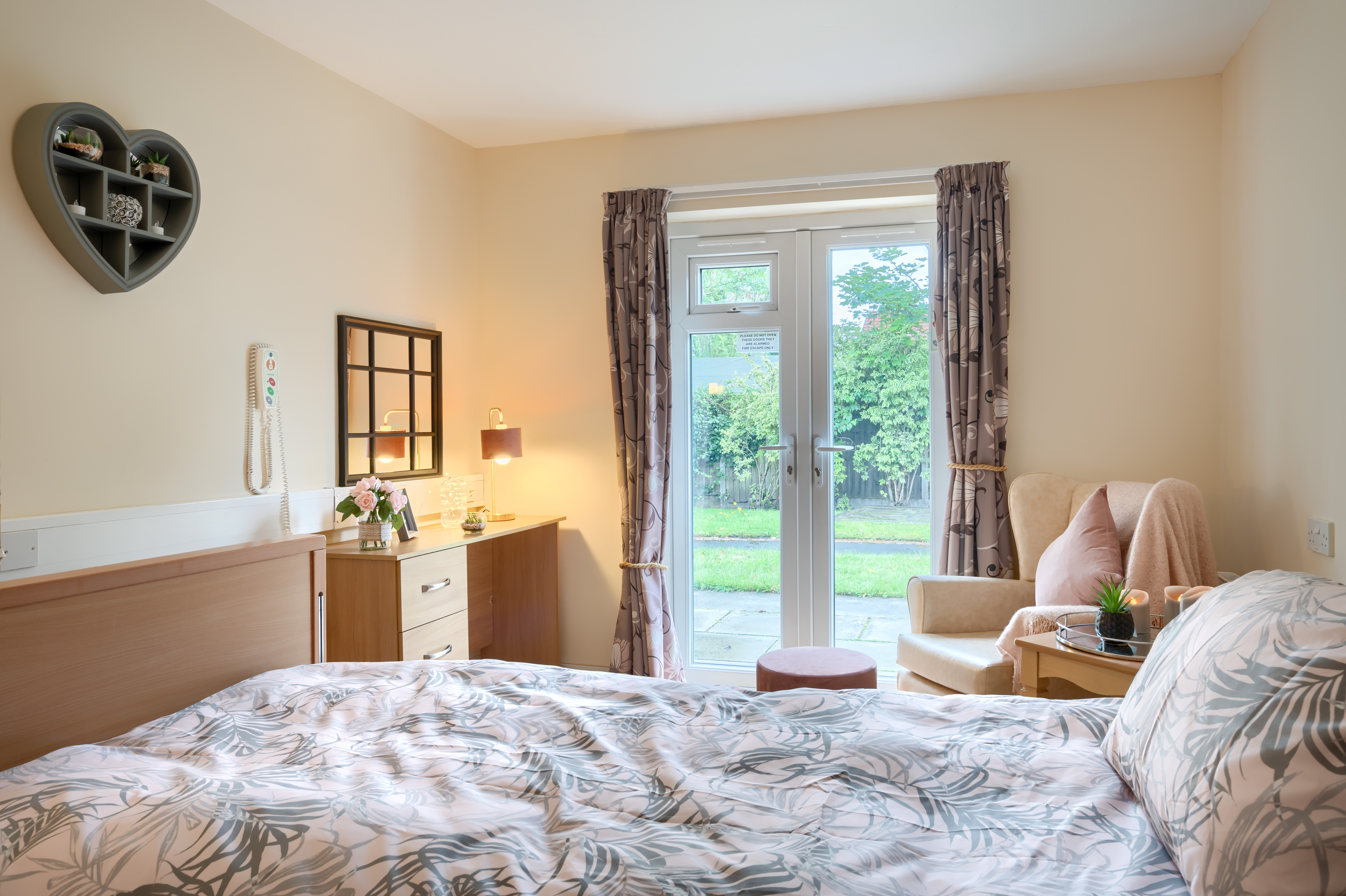 Resident bedroom with access in to our beautiful garden