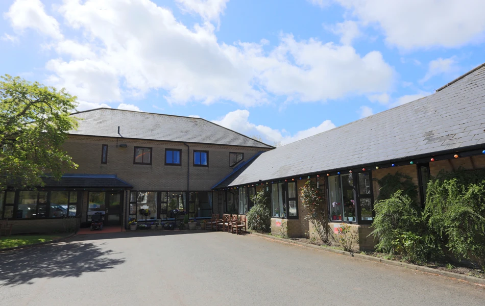 Abbeyfield Care Home on a sunny day with blue sky