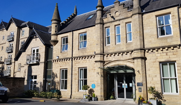 The outside of the house showing the entrance doors