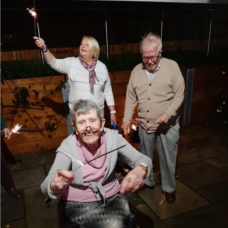 Residents Enjoying Celebrating Bonfire Night At Harleston House