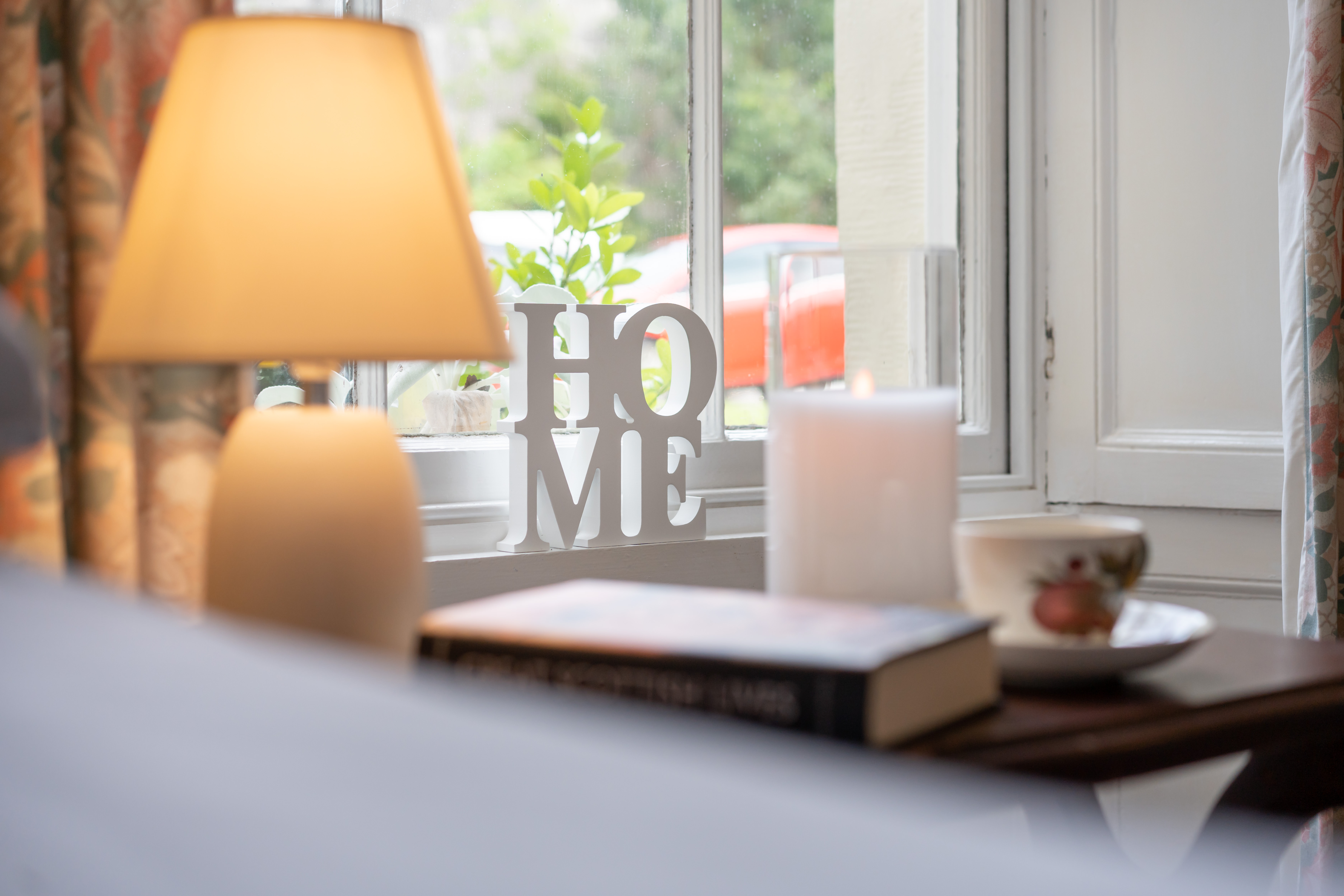 Home Ornament In Sash Window