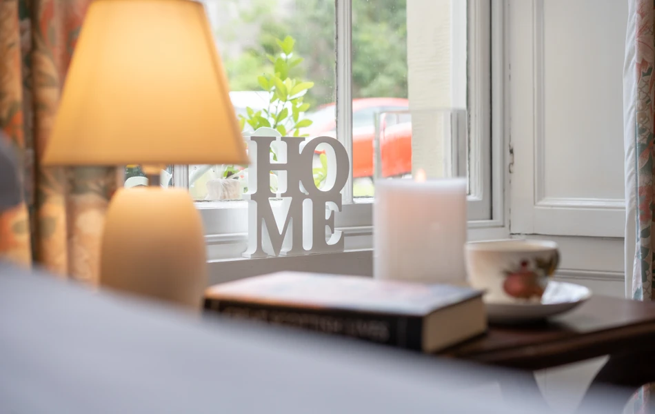 Home Ornament In Sash Window