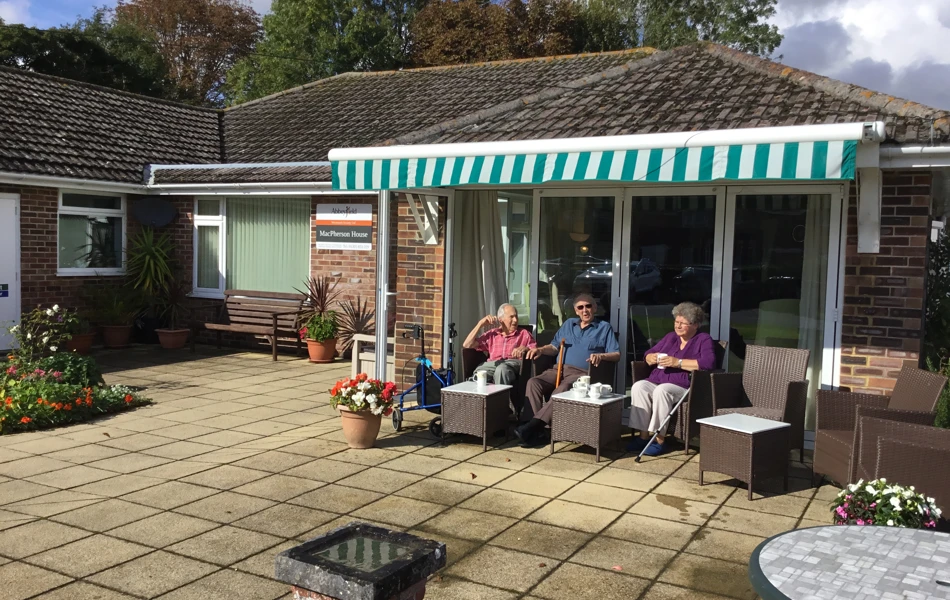 View from our lovely garden MacPherson House with residents sit and relax in the sun