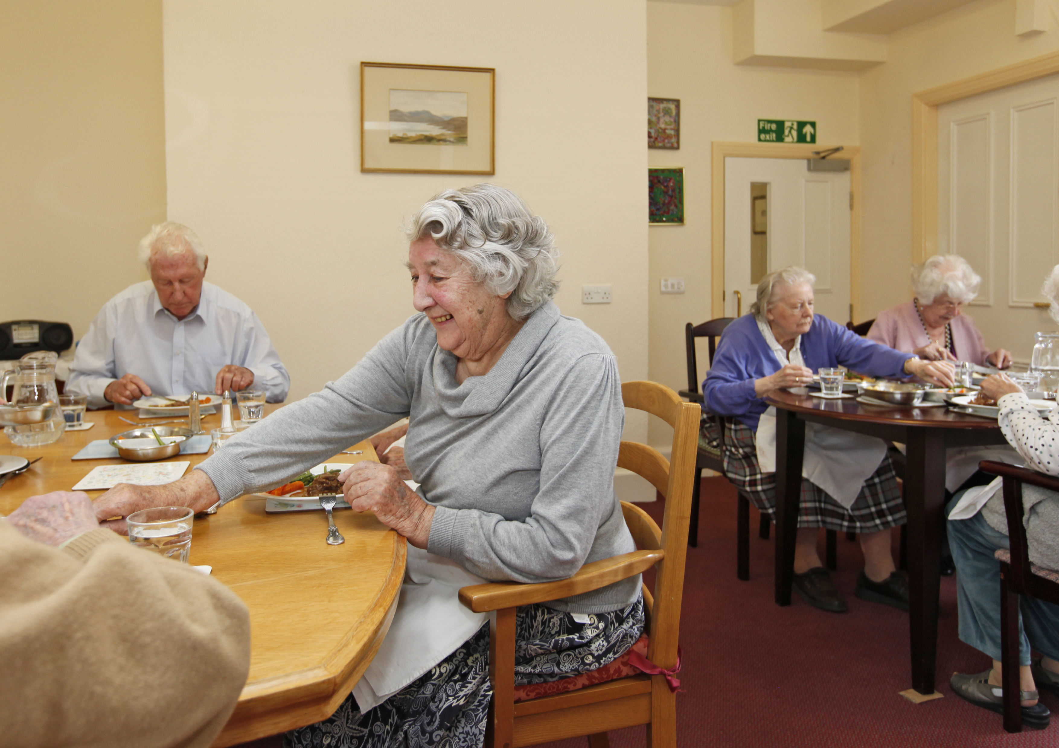Residents sat in the dining room enjoying a meal