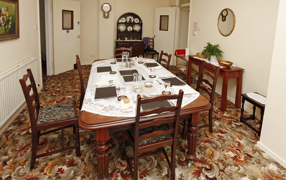Residents' dining room at Abbeyfield Swansea, SA1 4QP