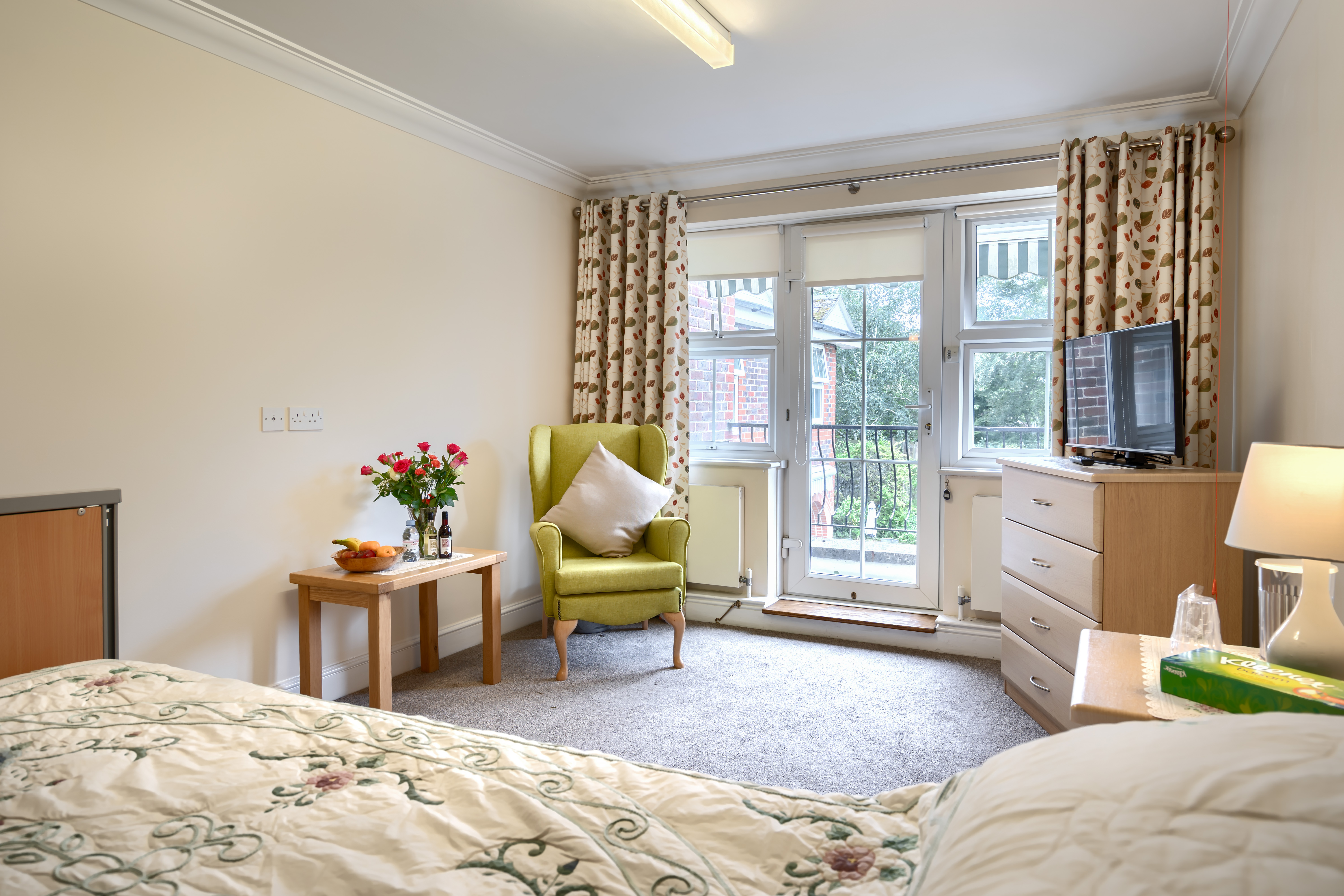 Lee House residents single bedroom with furniture