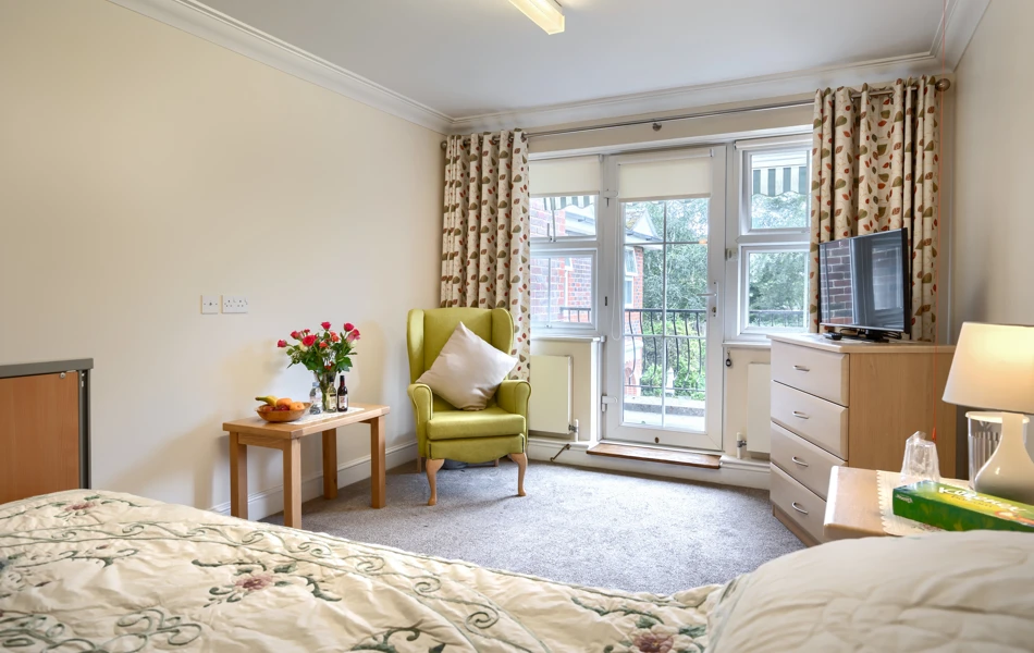 Lee House residents single bedroom with furniture