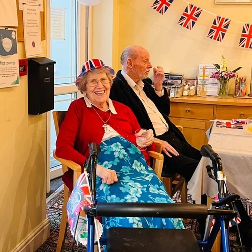 An older lady and man celebrating the queens jubilee