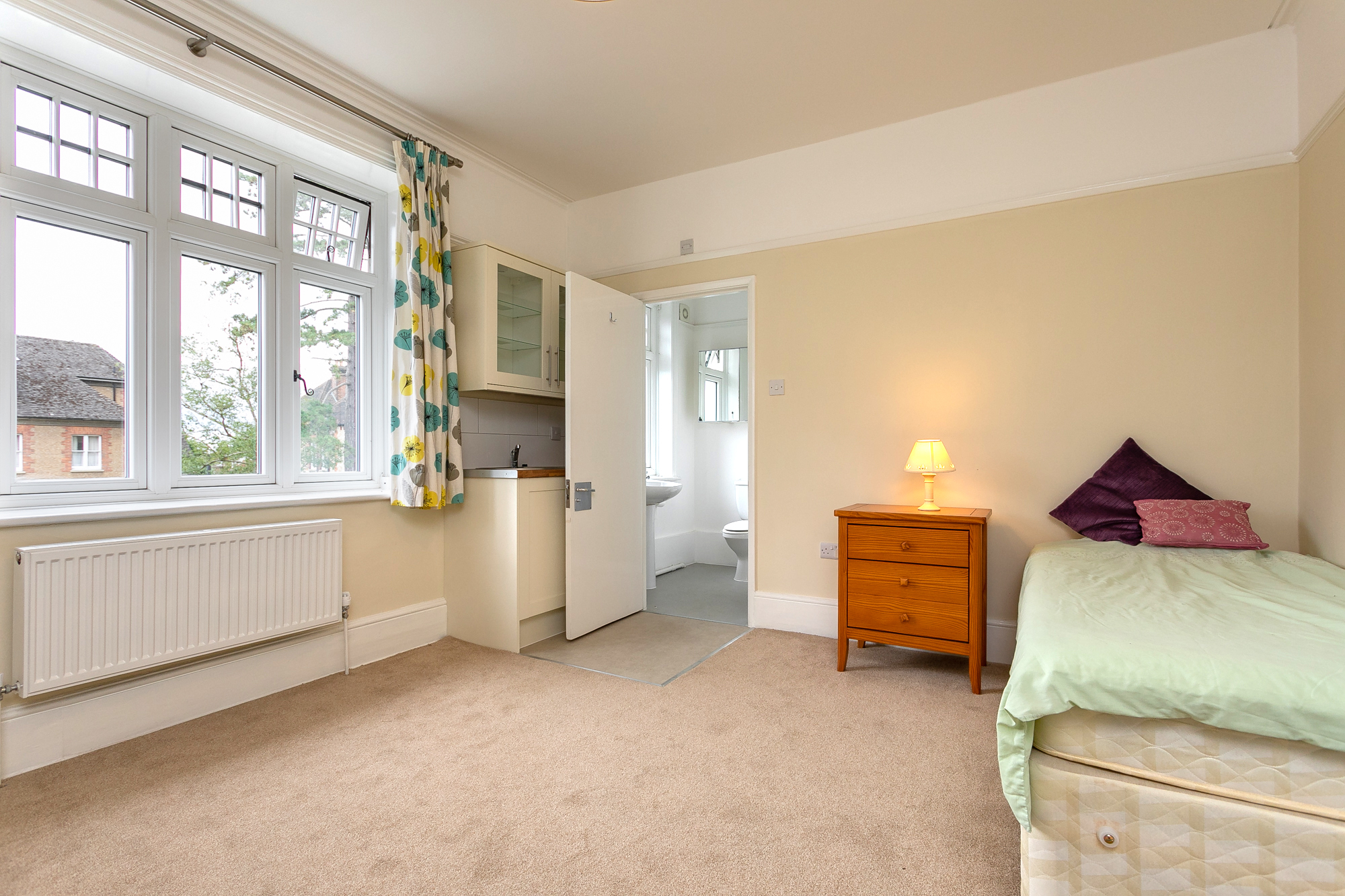 Bed and bathroom in Abbeyfield House, Reigate RH2 9DZ