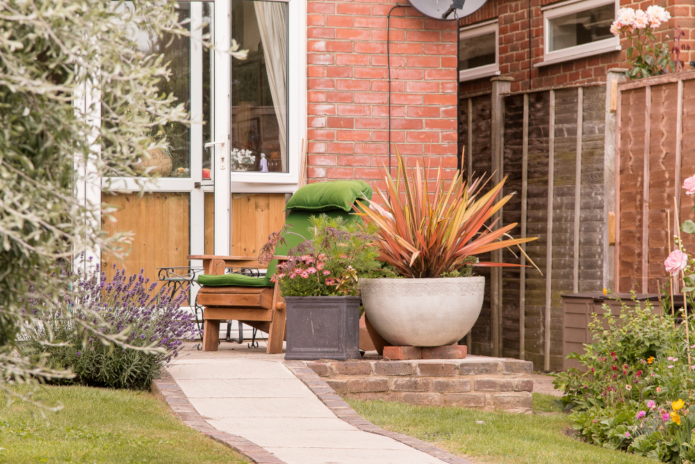 Table and chair on the patio where residents can relax in the fresh air