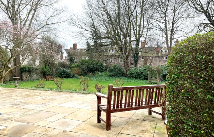 Patio area and bench at Abbeyfield House, Norwich NR1 4EH