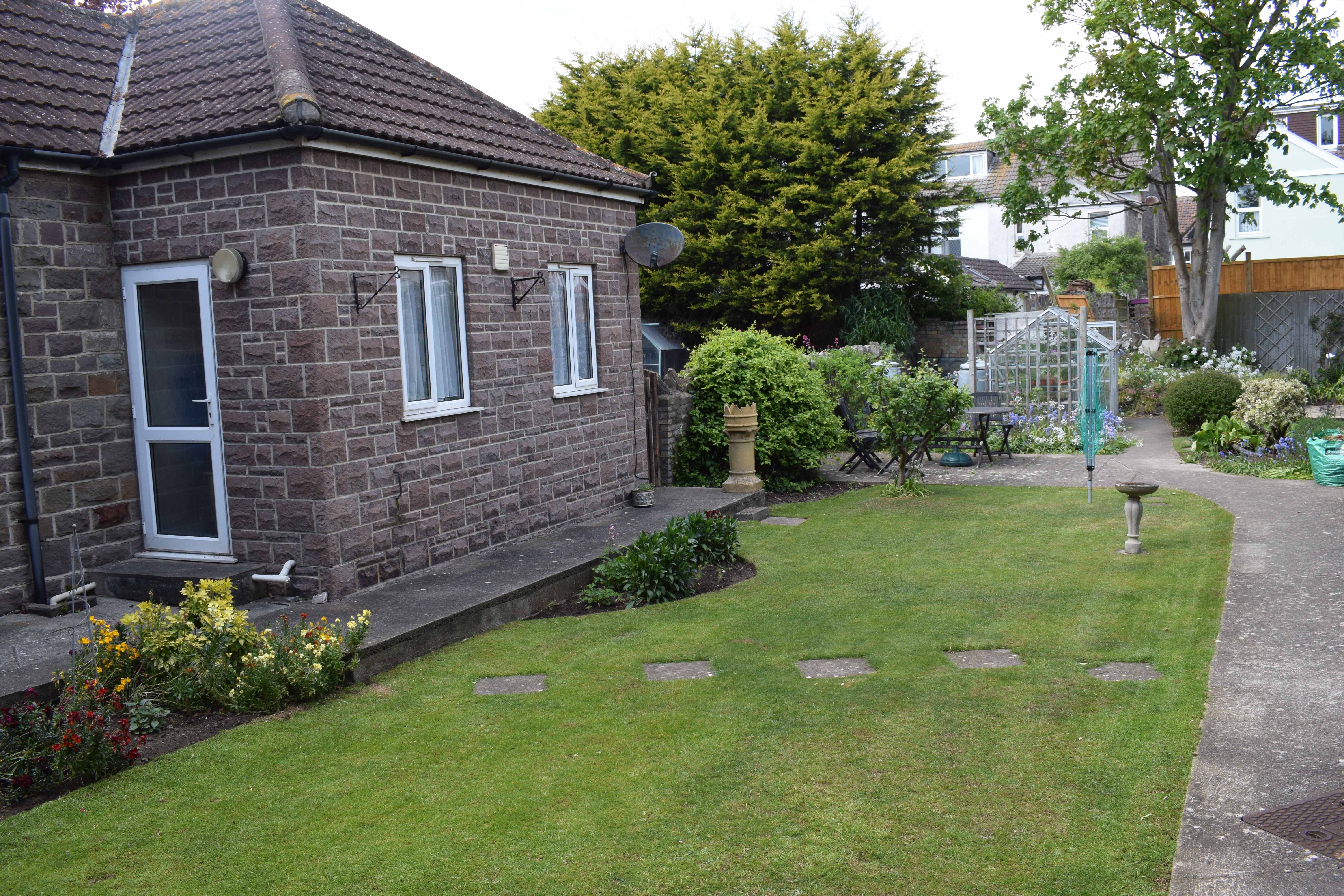 Enjoy the sunshine in our garden at Abbeyfield with rooms available to rent