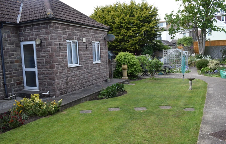 Enjoy the sunshine in our garden at Abbeyfield with rooms available to rent