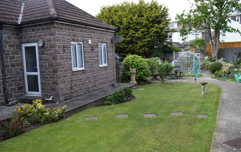 Enjoy the sunshine in our garden at Abbeyfield with rooms available to rent