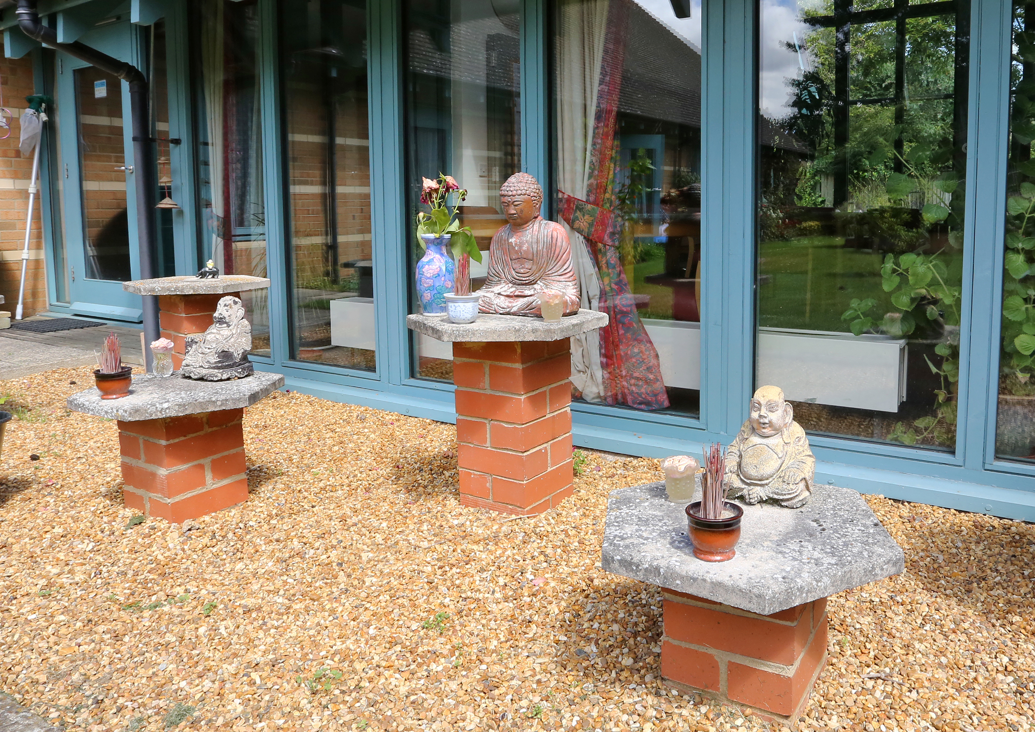 External shrines at An Lac House, Cambridge CB1 3HN