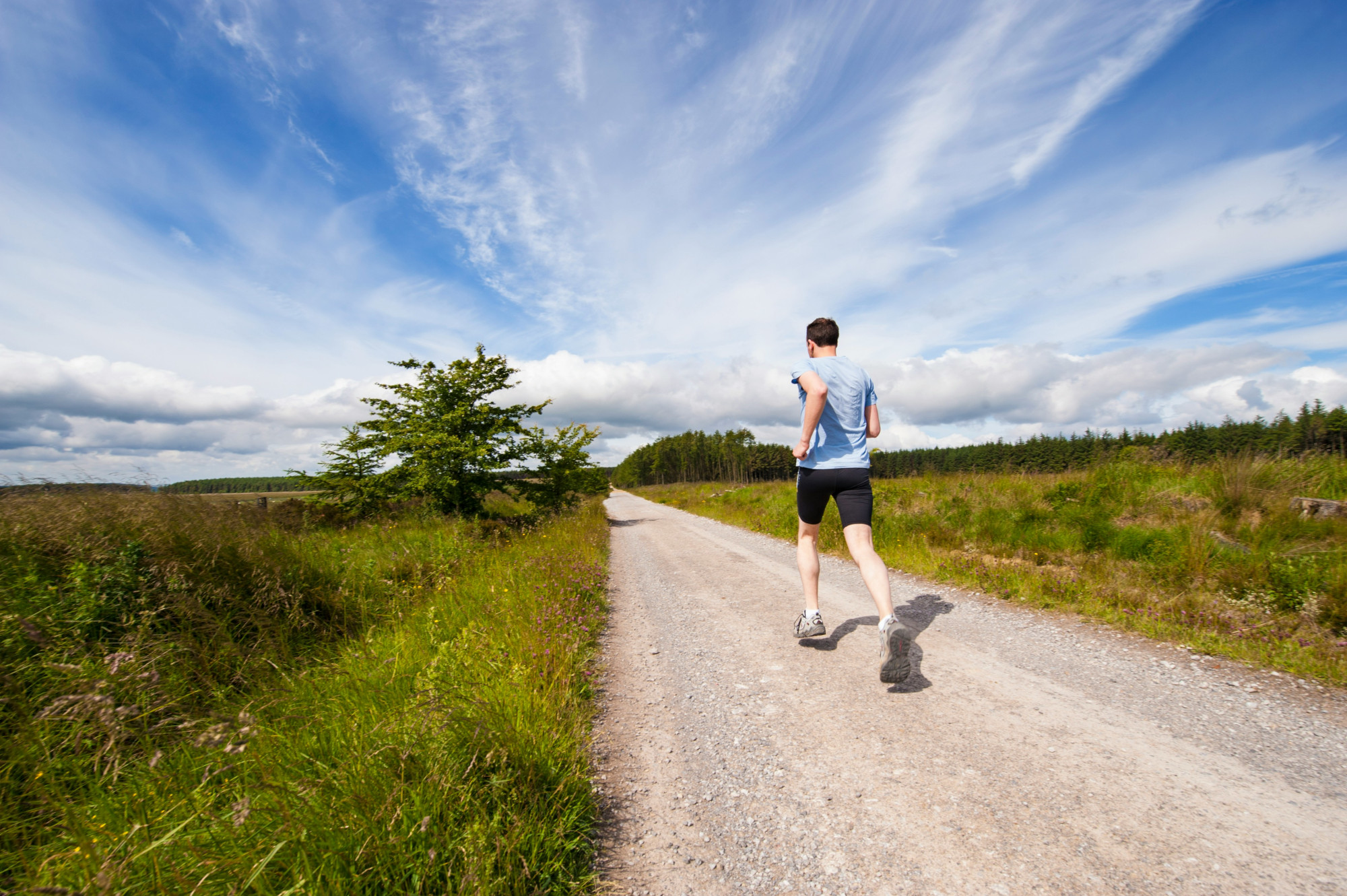 Man Running Through Countryside