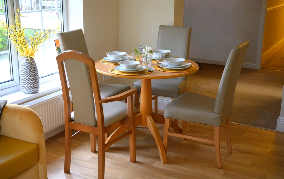 Dining table set for dinner